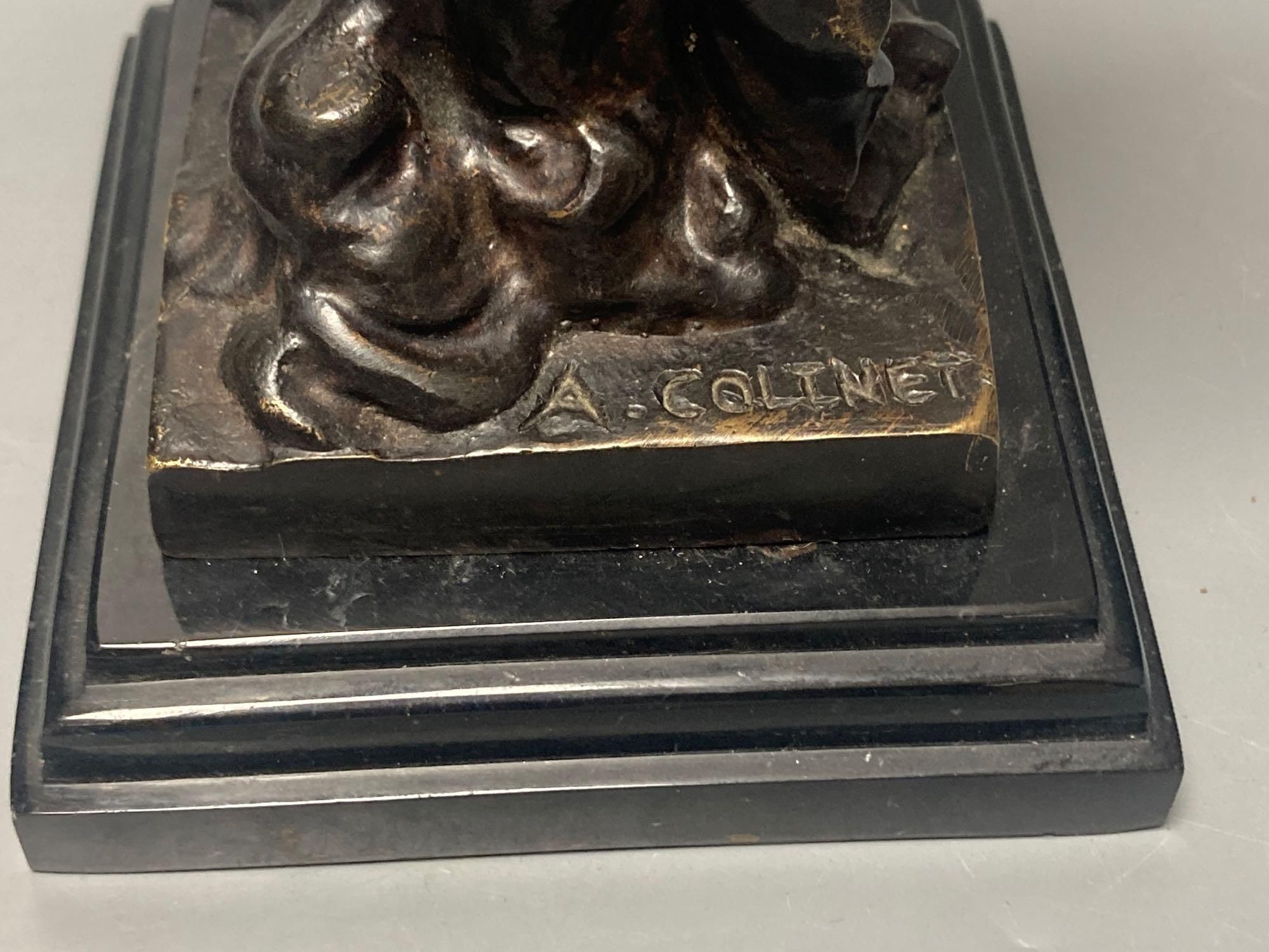 After A. Colinet bronze of Pierrot on a quatre moon, 33cm. high